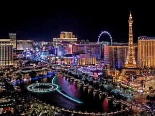 Night view of the Strip with buildings, hotels and casinos lit up