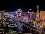 Night view of the Strip with buildings, hotels and casinos lit up