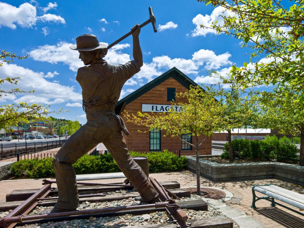 Monument to the worker of the railway station on the Route 66, Flagstaff, USA