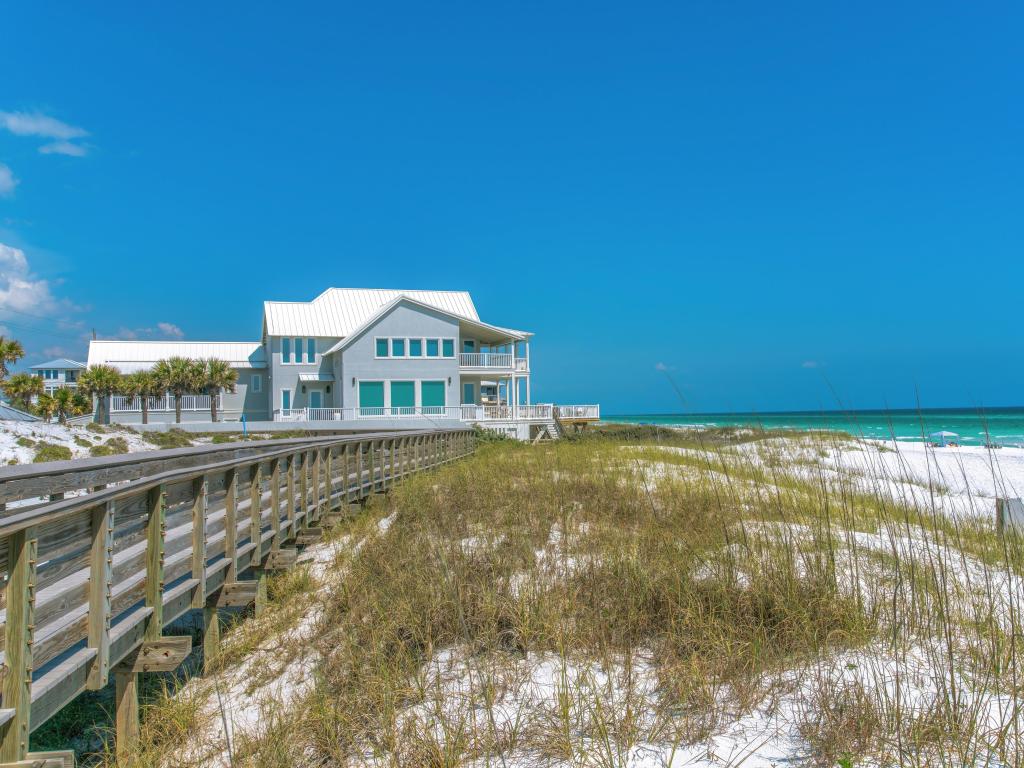 White Beach House on the Boardwalk in Destin Florida, on a sunny day