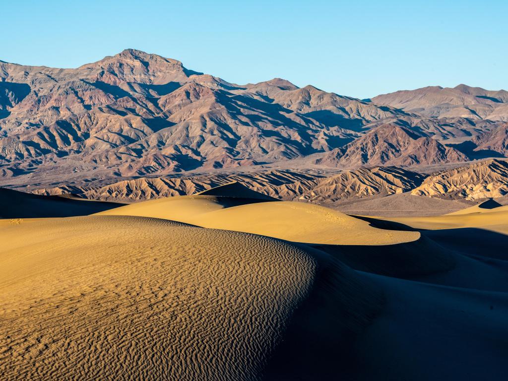 Light and shadows falling across the sands of Mesquite Dunes, Death Valley National Park