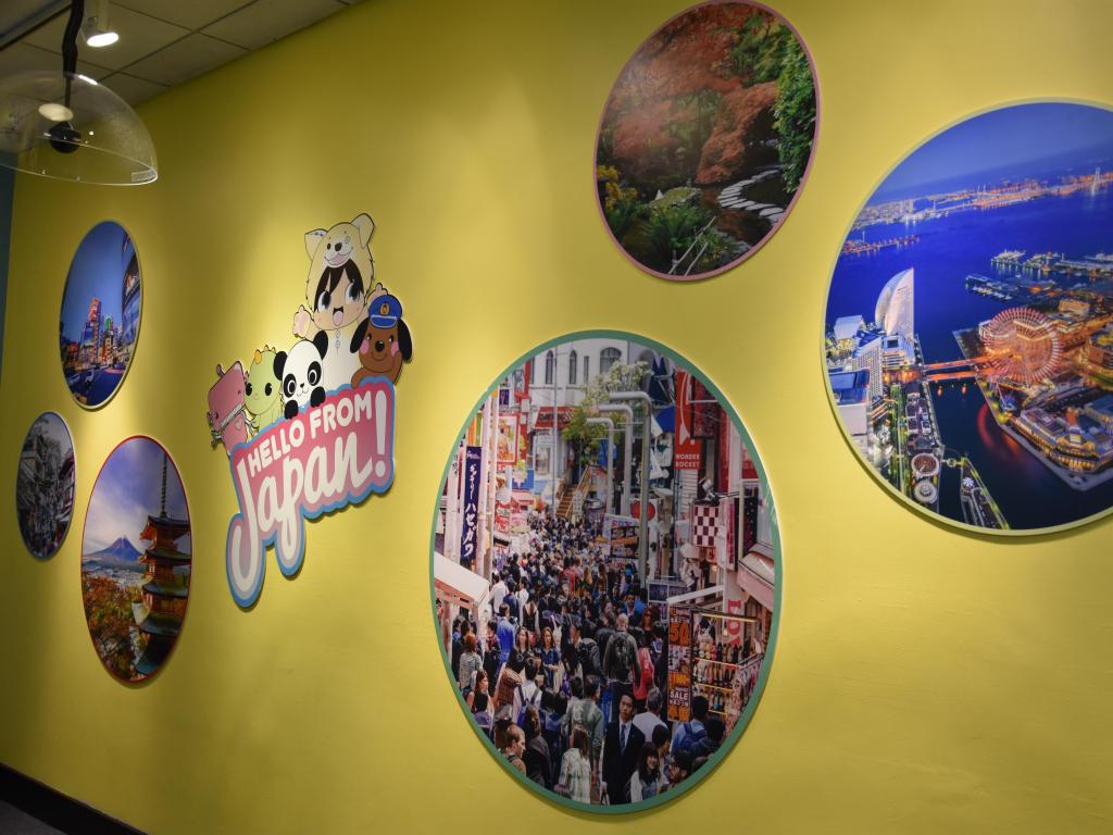 Wall display about Japan, with different scenes of the country, at Children's Museum of Manhattan in New York