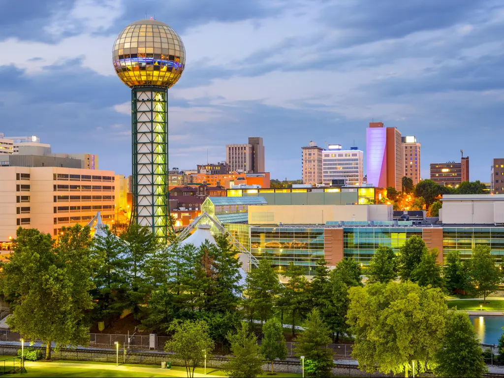Knoxville, Tennessee, USA city skyline at World's fair Park at early evening.