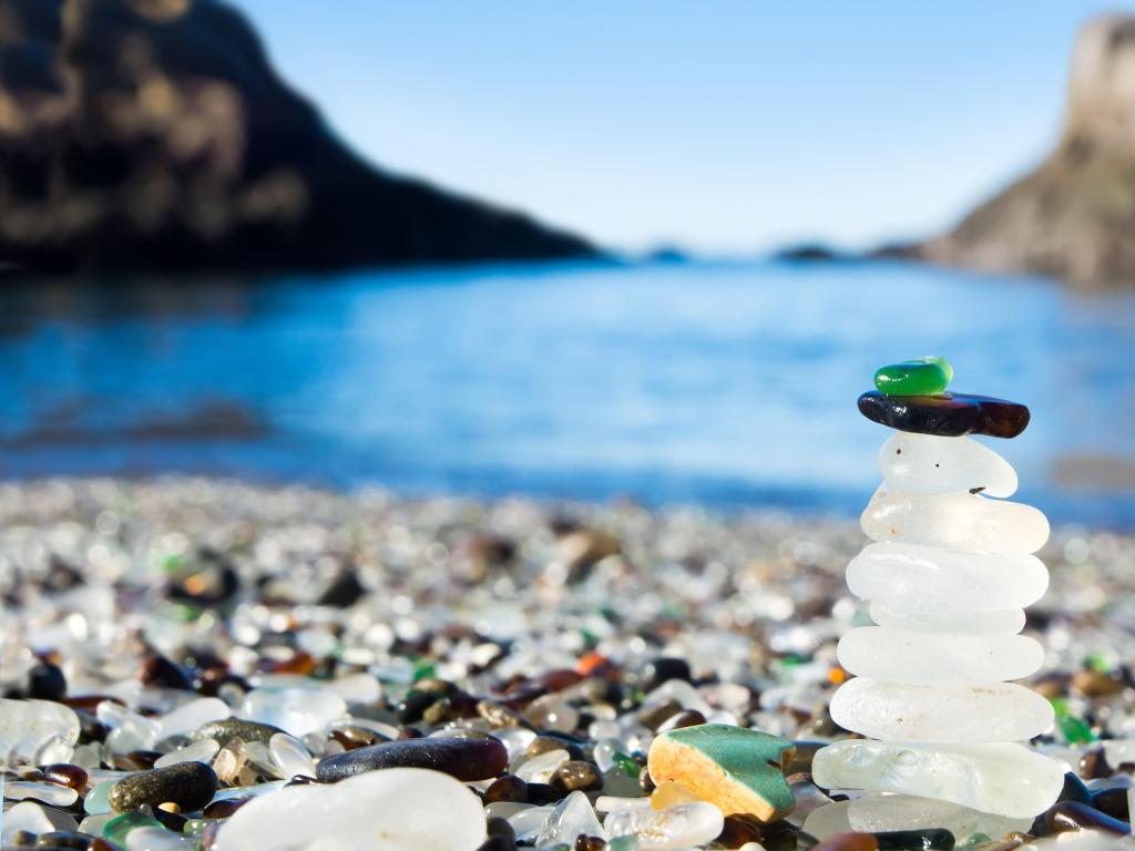 Tower of polished sea glass pebbles on Glass Beach in MacKerricher State Park, California