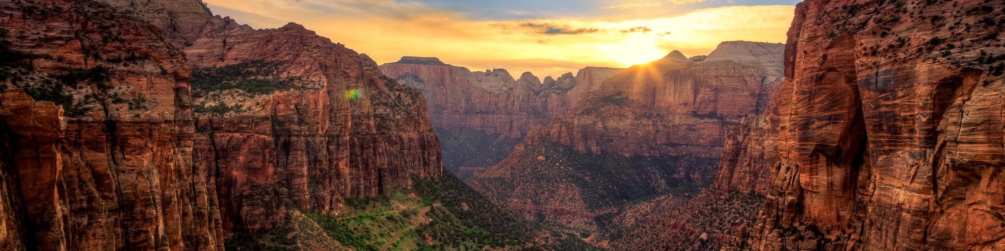 The golden sunset is cascading over the Zion Canyon in Zion National Park, Utah.