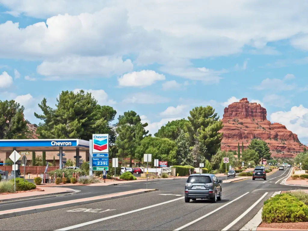 Oak Creek Village along route 179 towards Sedona on a sunny morning with Bell Rock in the background.