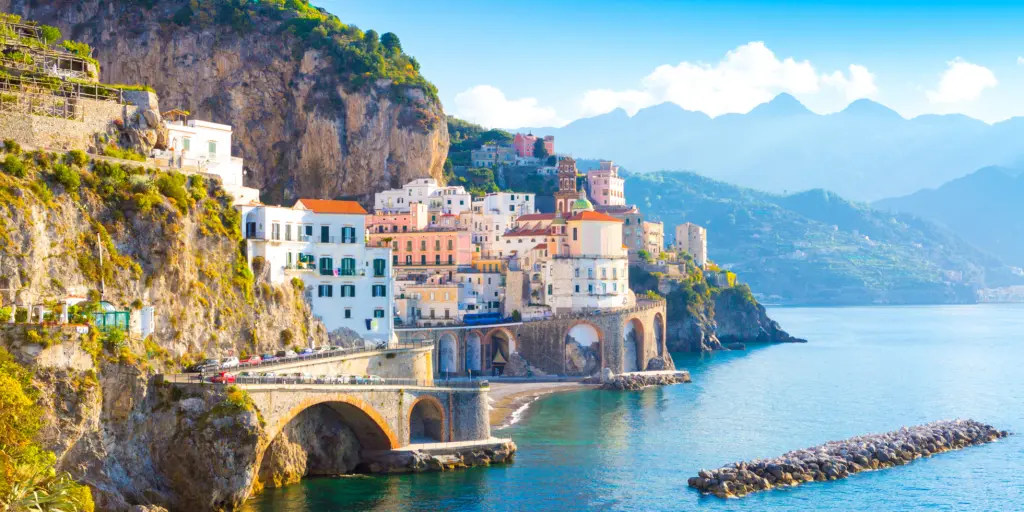 Morning view of Amalfi cityscape on coast line of Mediterranean sea