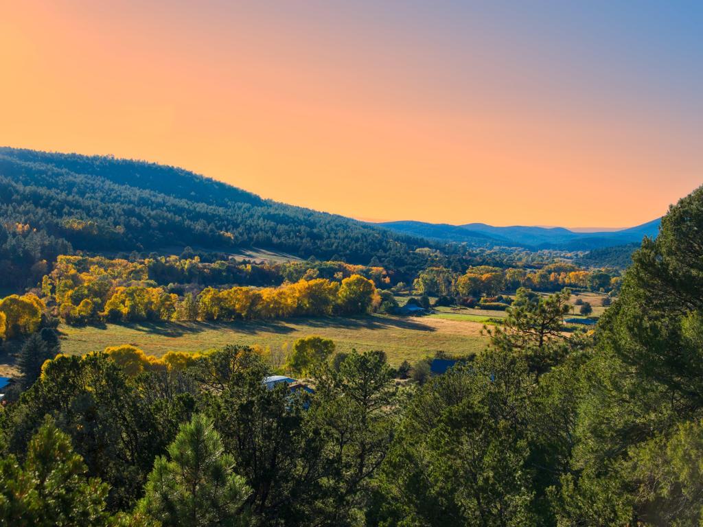 Sunset in a valley on the Scenic drive from Albuquerque, New Mexico to Santa Fe, New Mexico.