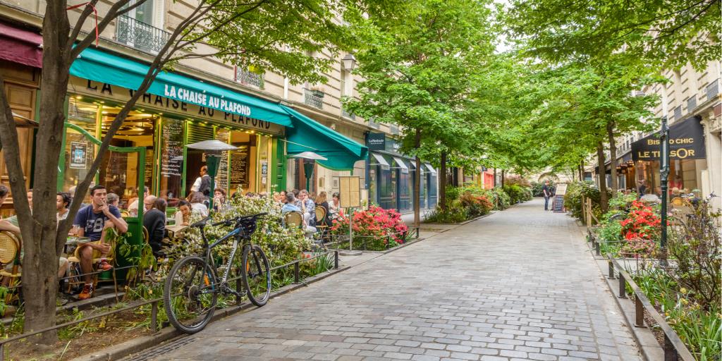 A quiet leafy street in Le Marais neighbourhood in Paris