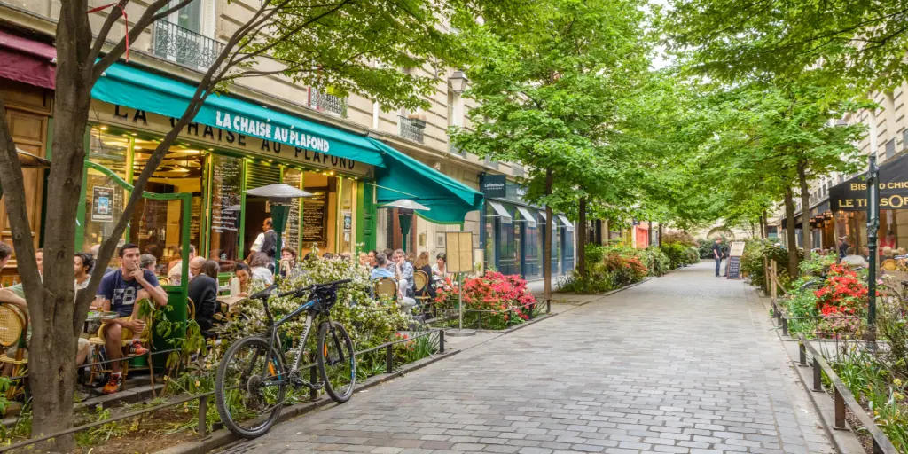 A quiet leafy street in Le Marais neighbourhood in Paris
