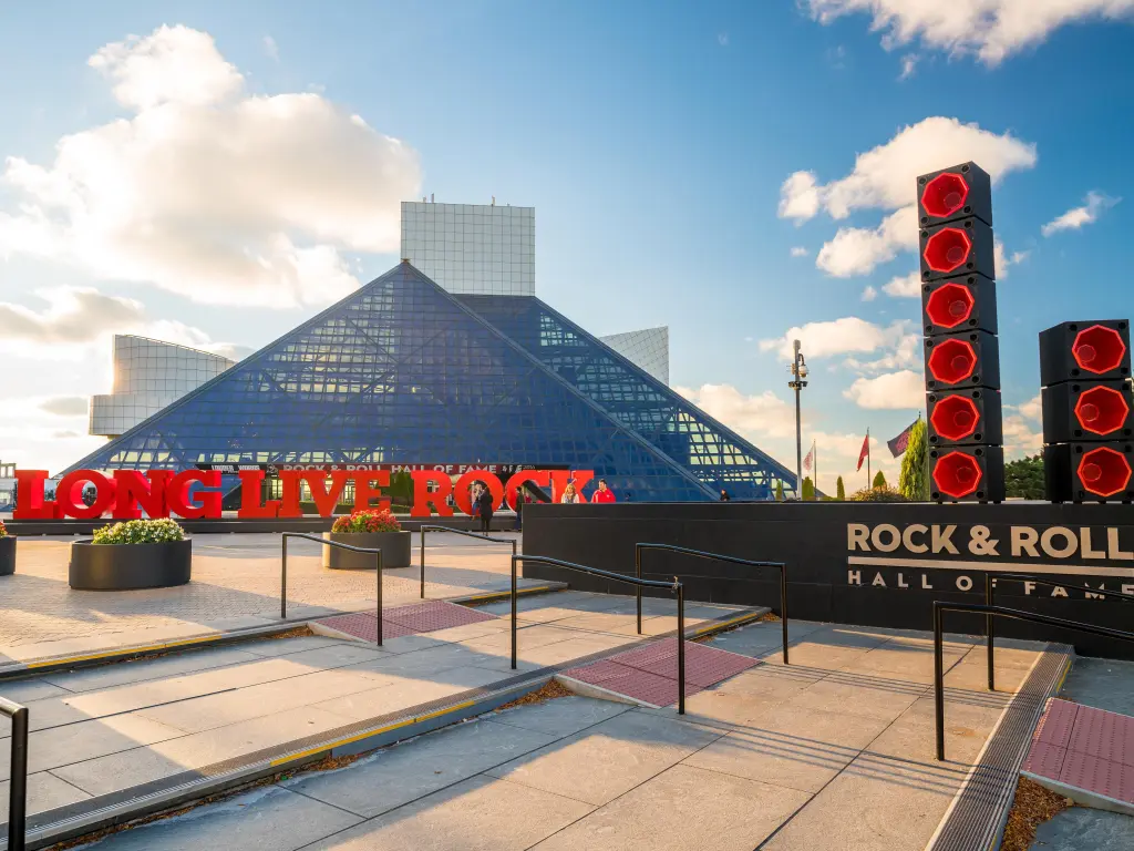 The museum's facade on a sunny day with a red sign that reads "Long Live Rock"