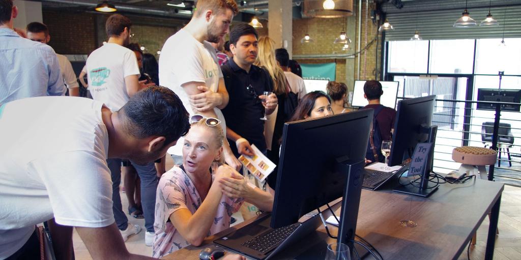 People try out the LazyTrips tool as the launch event