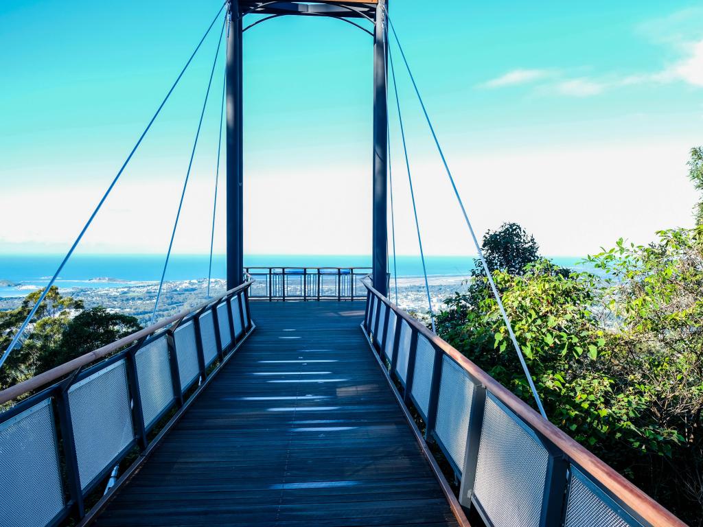 Port Mcquarie, Australia with a high lookout platform with views of the sea in the distance on a clear sunny day.