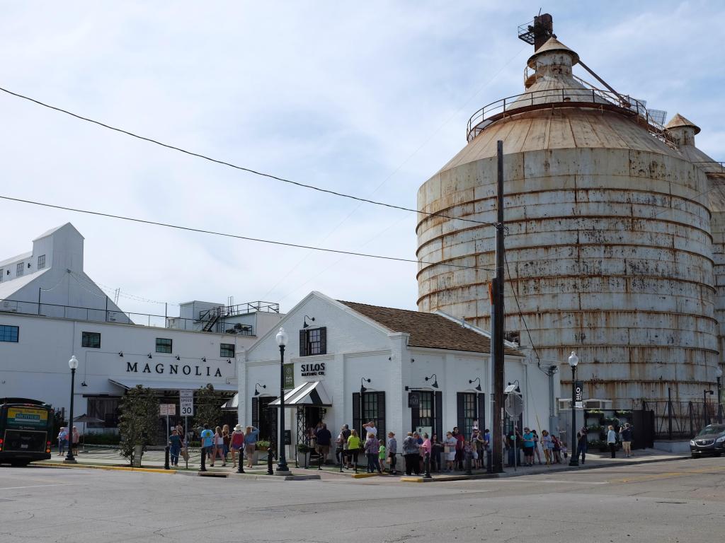 Visitors queue outside the famous Silos at Magnolia Market in Waco, TX