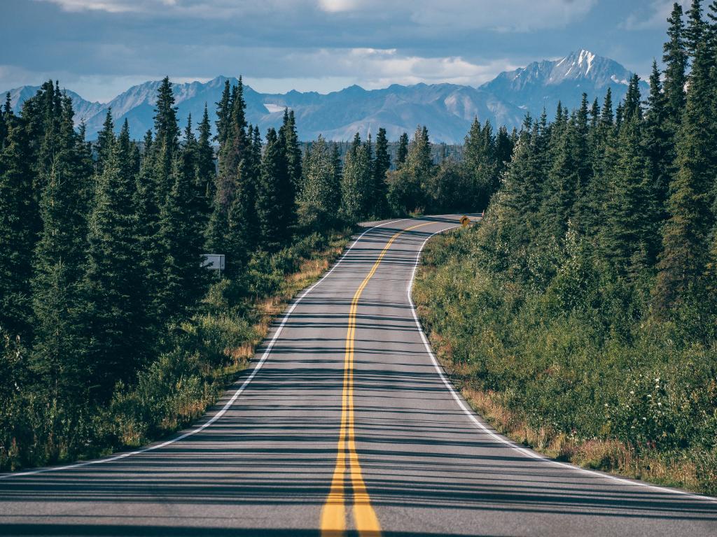 The stunning scenery passing through the forests and mountains on the Alaska highway.