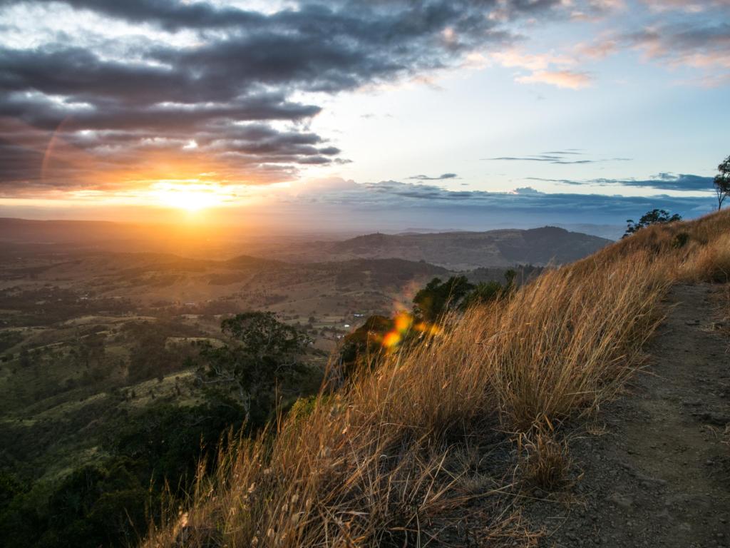 Table Top Mountain, Toowoomba, Australia at sunset looking down to the valley and mountains below.