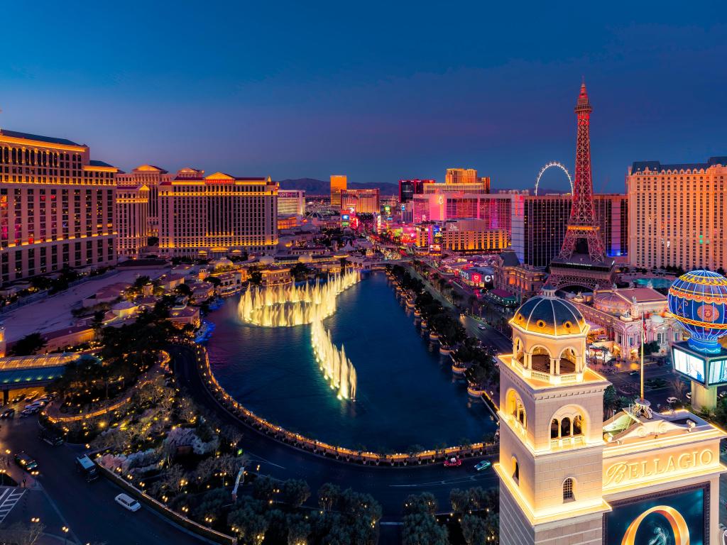 High angle view of fountain show and Las Vegas skyline in Nevada at sunset, USA