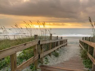 Myrtle Beach, South Carolina, USA taken at sunrise along boardwalk over a sand dune.