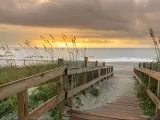 Myrtle Beach, South Carolina, USA taken at sunrise along boardwalk over a sand dune.