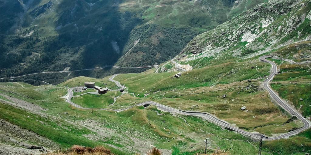 Winding road on green mountain Great St Bernard Pass, Switzerland/Italy