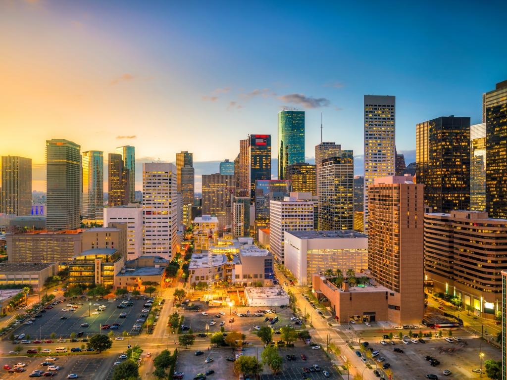 Skyscrapers in downtown Houston in the evening as the sun sets.