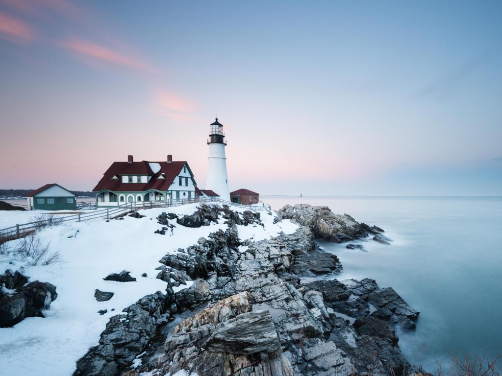 New England's iconic Portland Head Lighthouse in winter.