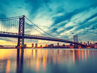 Ben Franklin Bridge in Philadelphia at sunset on a cloudy day