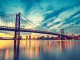 Ben Franklin Bridge in Philadelphia at sunset on a cloudy day