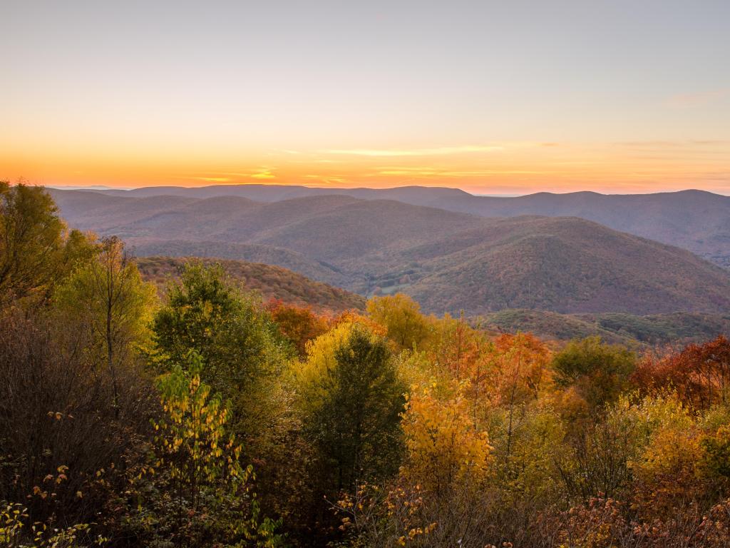 Berkshires, MA, USA with a majestic autumnal landscape overlooking trees and valleys in the distance. 