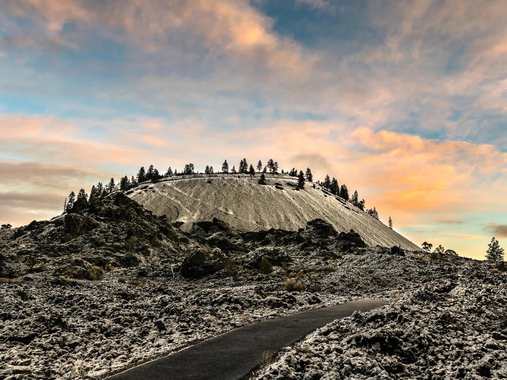 Newberry National Volcanic Monument, USA taken at early winter at Snow Lava Butte at Newberry National Volcanic Monument with a fresh dusting of early winter snow and a pretty sky in the background.