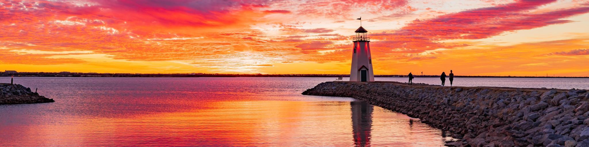 Sunset beautiful afterglow over the lighthouse of Lake Hefner, Oklahoma City, Oklahoma, USA.