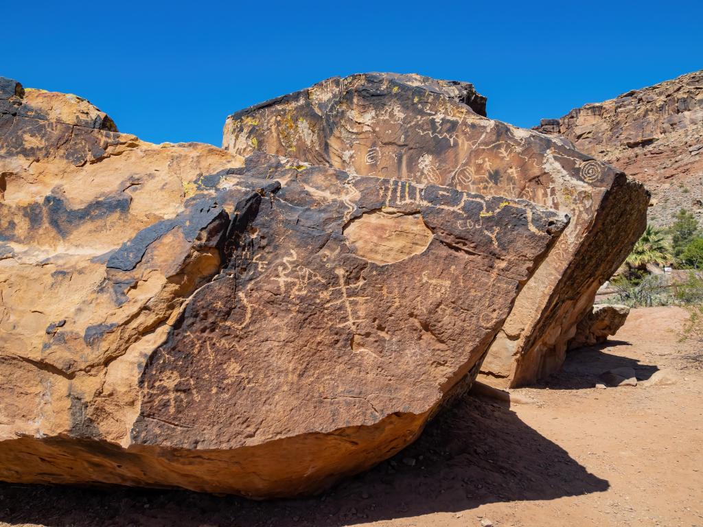 Bloomington Petroglyph Park at St. George, Utah, USA with a sunny exterior view of the petroglyphs on a clear sunny day.