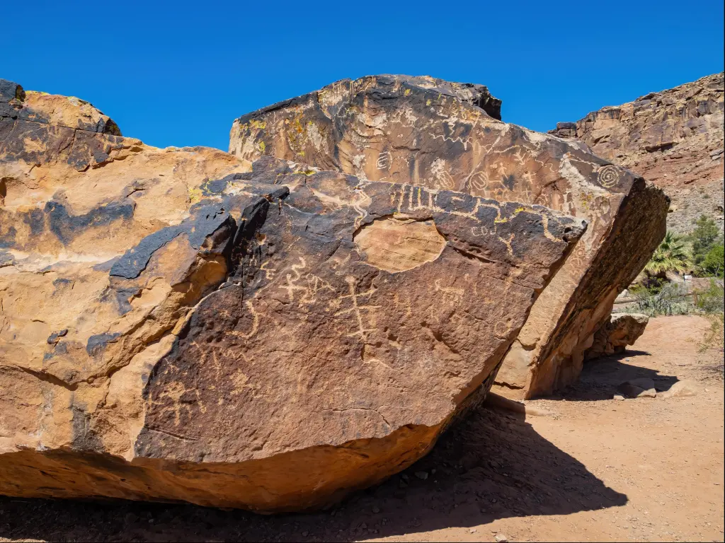 Bloomington Petroglyph Park at St. George, Utah, USA with a sunny exterior view of the petroglyphs on a clear sunny day.