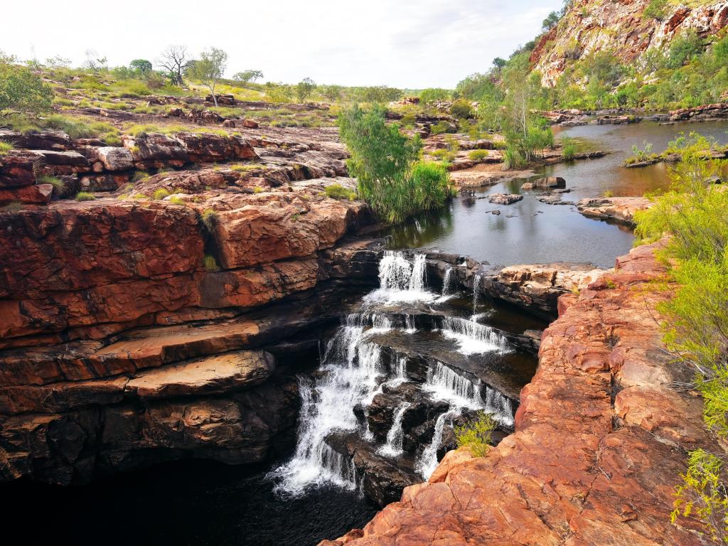 Bell Gorge, North West of Western Australia with a view of the spectacular cascading waterfall at Bell Gorge, fed by the Isdell Range on the Gibb River Road.