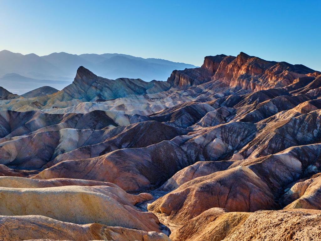 Zabriski Point, Death Valley National Park, USA with a view of the mudstones that form the Badlands on a sunny day.