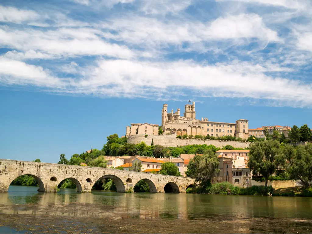 Old bridge and Saint Nazaire cathedral on the Orb river in Beziers, France.