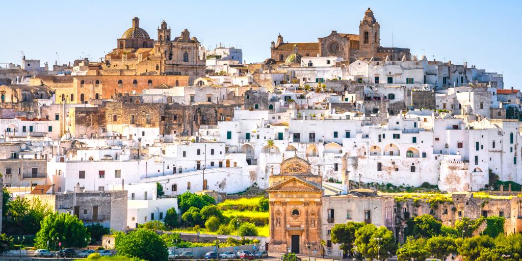 A long shot of Ostuni against a blue sky 