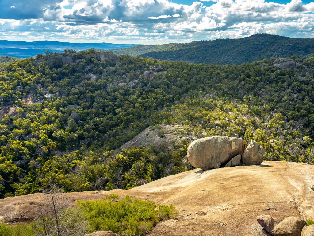 View from the top onto the densely forested valleys of the national park