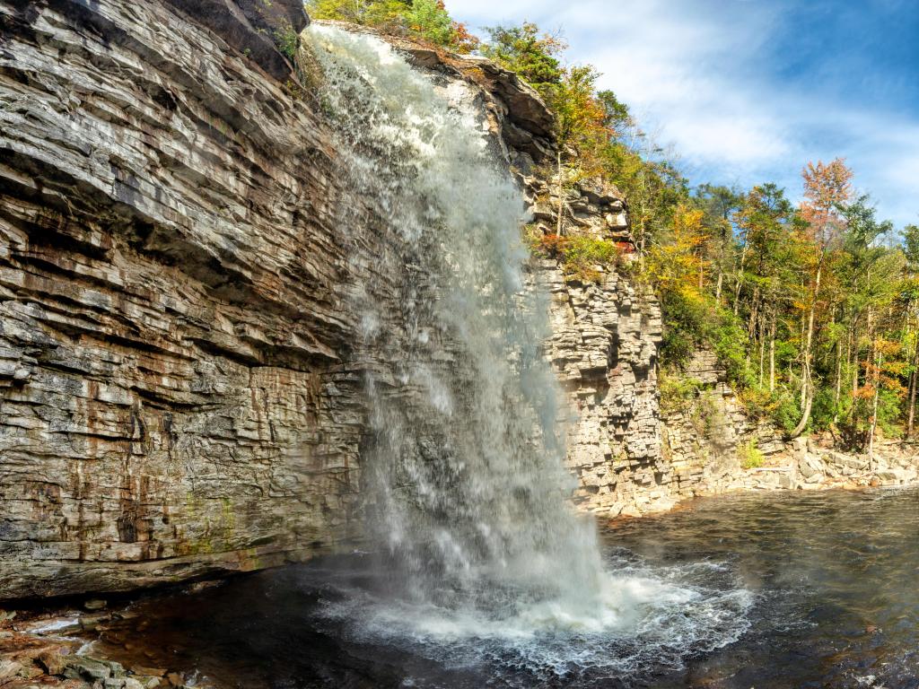 Panoramic view of crashing Awosting Falls in Minnewaska State Park Reserve surrounded by fall foilage colors 