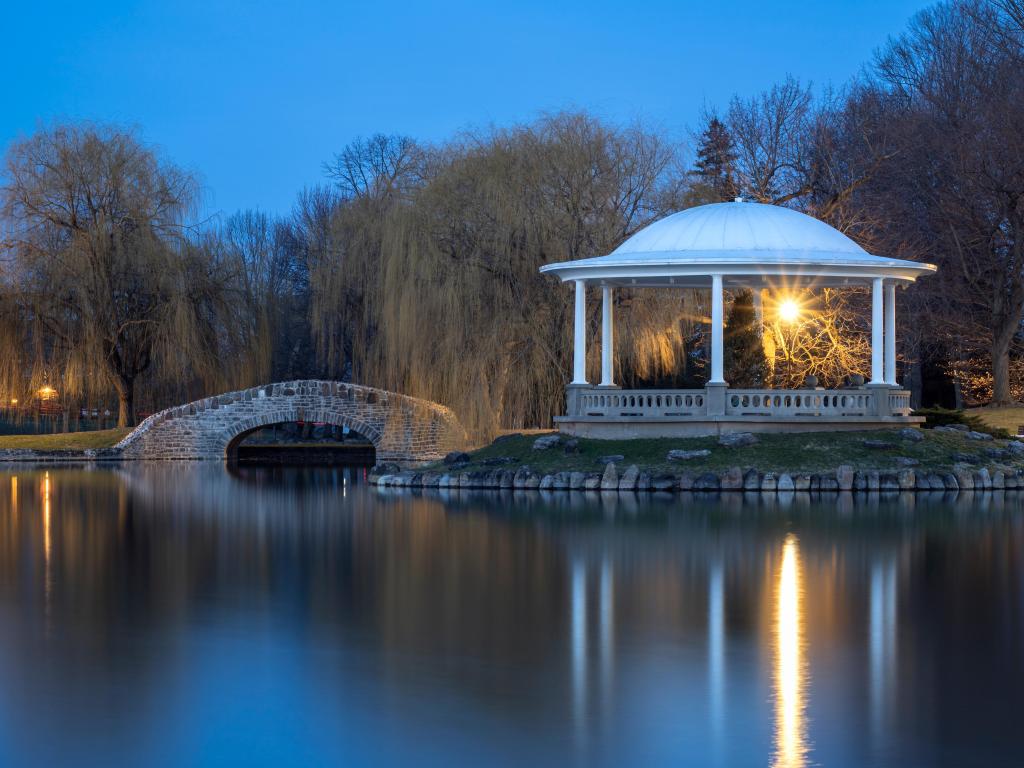 Hiawatha Lake Gazebo in Onondaga Park, Syracuse, New York, USA taken at night with a view of Hiawatha Lake Footbridge and Gazebo, known locally as Central Park.