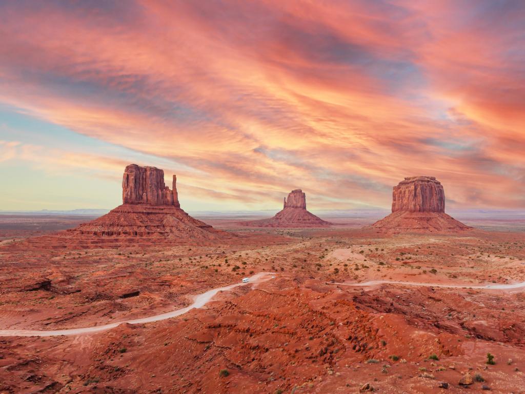 Monument Valley, Arizona, USA with a stunning sunset over the valley.