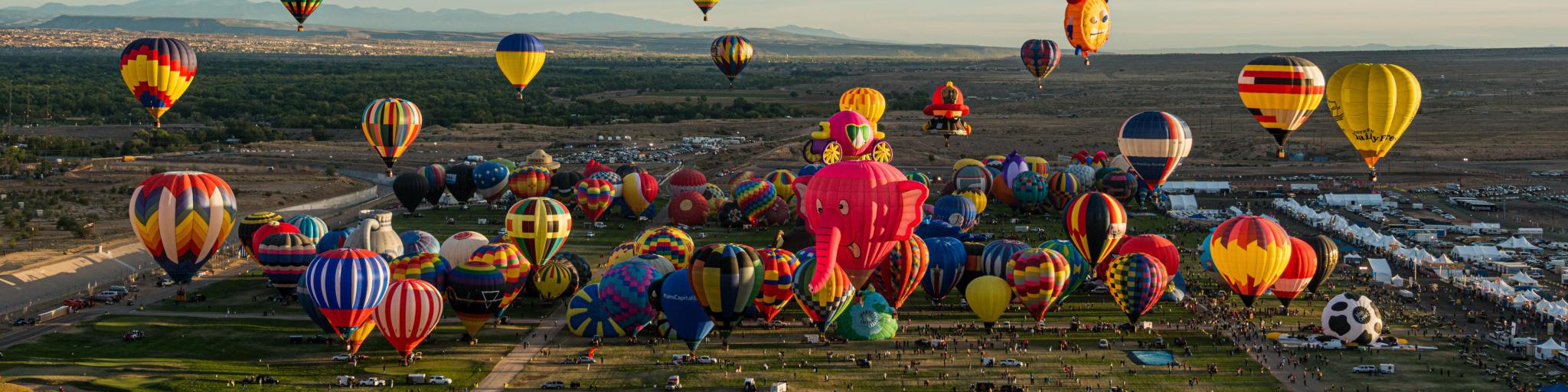 Aerial photo of the rising hot air balloons during Albuquerque International Balloon Fiesta