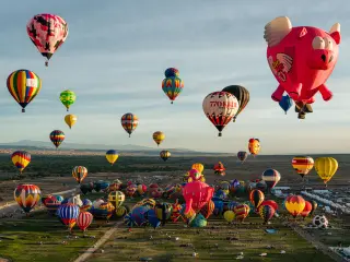 Aerial photo of the rising hot air balloons during Albuquerque International Balloon Fiesta