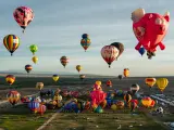 Aerial photo of the rising hot air balloons during Albuquerque International Balloon Fiesta