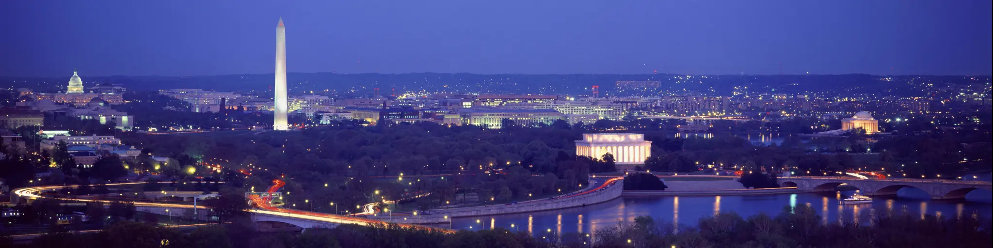 Washington DC Skyline at night, showing the Jefferson Memorial, U.S. Capitol, Washington Monument, and Lincoln Memorial.