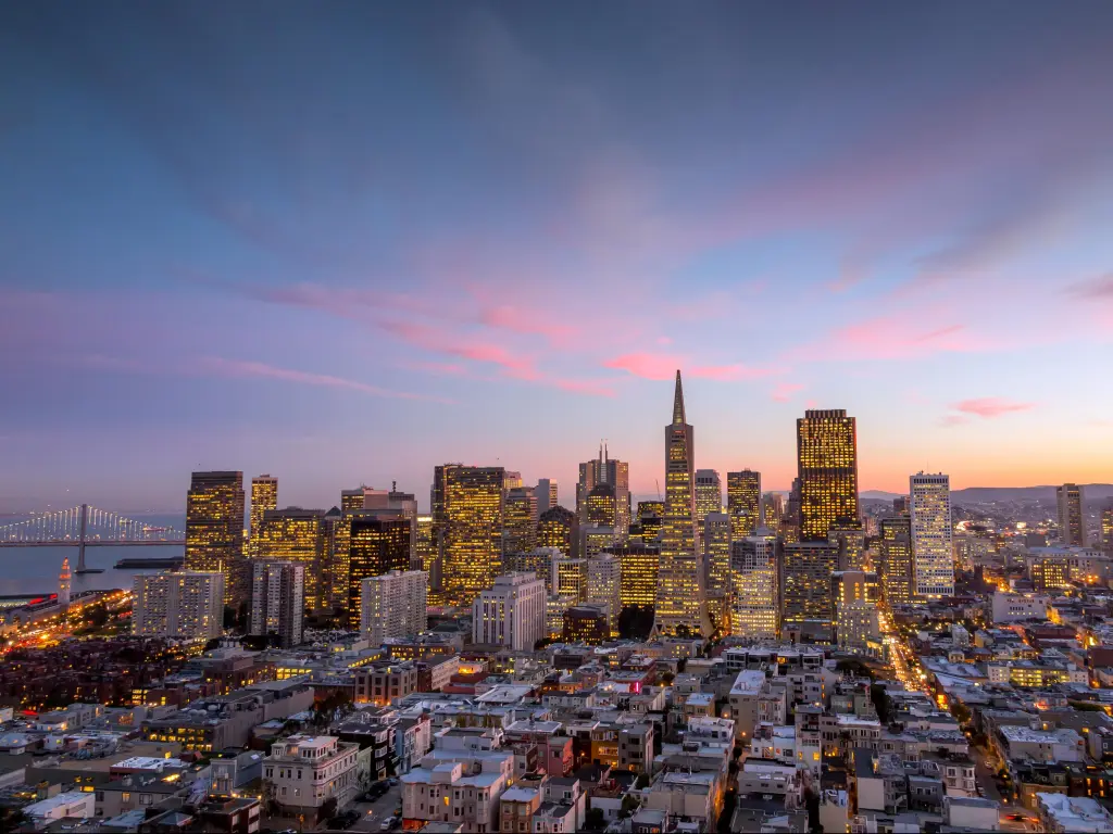 San Francisco, California, USA with a beautiful view of business center in downtown San Francisco at sunset.