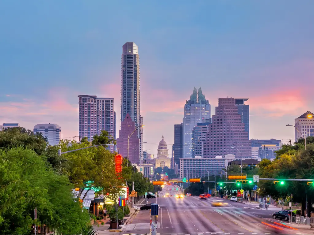 Austin, Texas, USA with a view of the city downtown skyline at sunset.