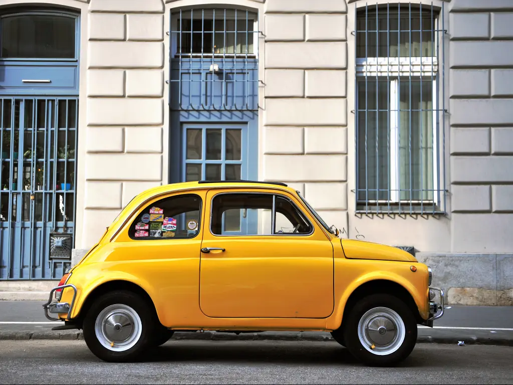 A bright yellow classic Beetle is one of the cars you can find in the Banana road trip game.