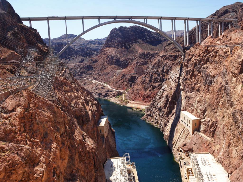 Picture of a Bridge over Hoover dam taken from another bridge on the border in between Nevada and Arizona.