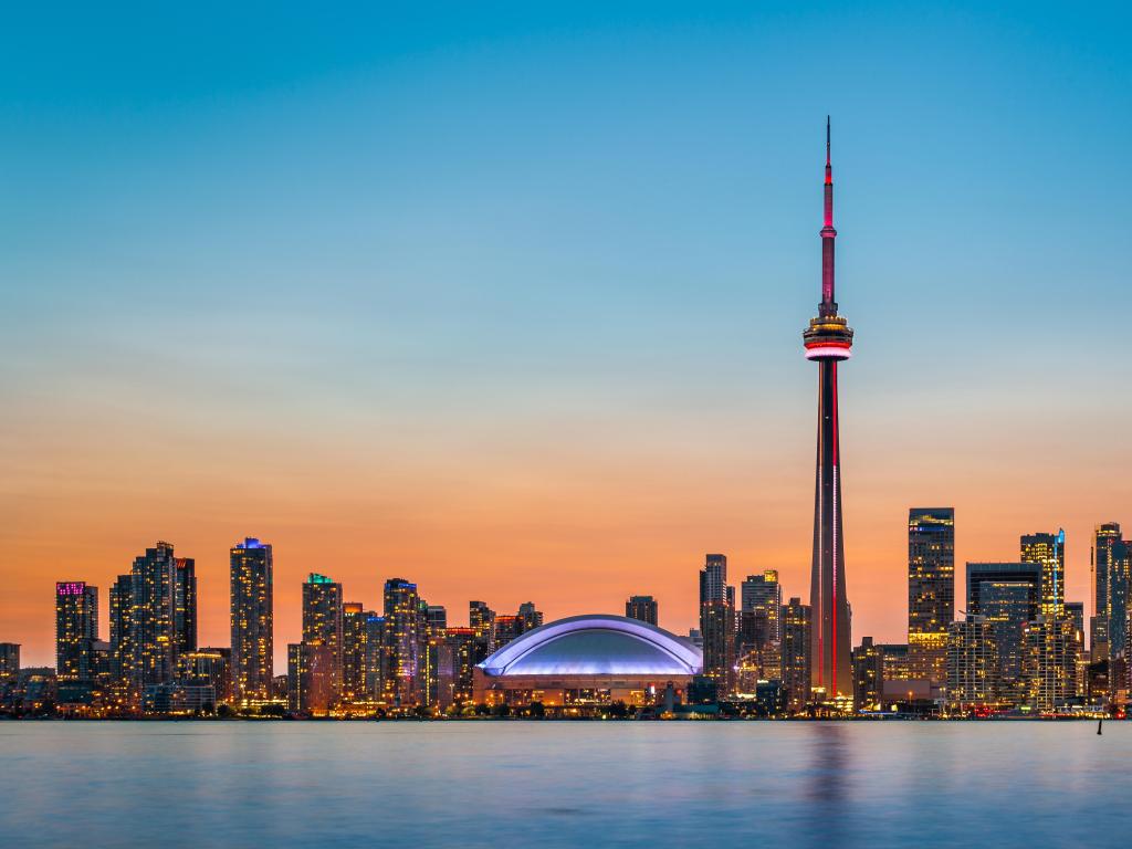Skyline of Toronto over Ontario Lake at twilight
